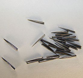 Textile pins - Combing